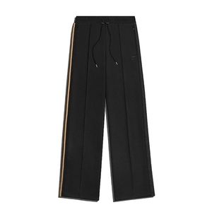 Ivy Park x Adidas Black/Gold 3-Stripes Pants